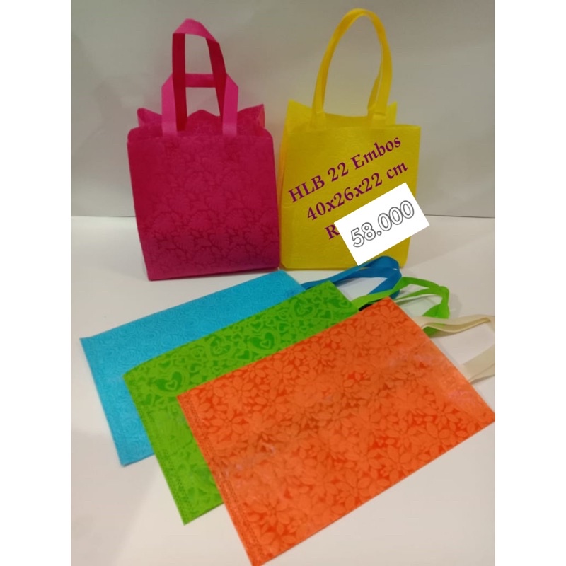 

isi 12pcs TAS SPUNBOND EMBOS PREMIUM TOTEBAG KUE