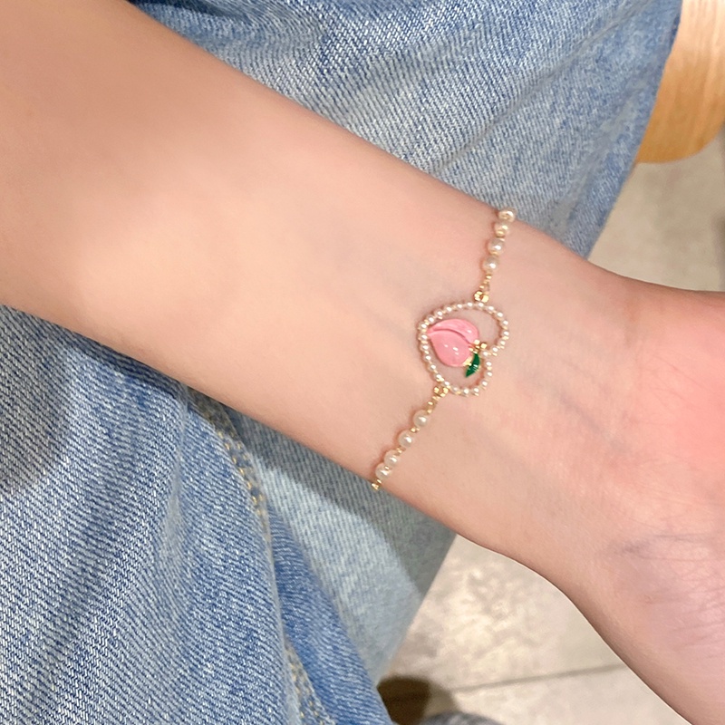 AY(CN) Gelang Rantai Mutiara Bentuk Hati Model Hollow Warna Pink Peach Untuk Wanita