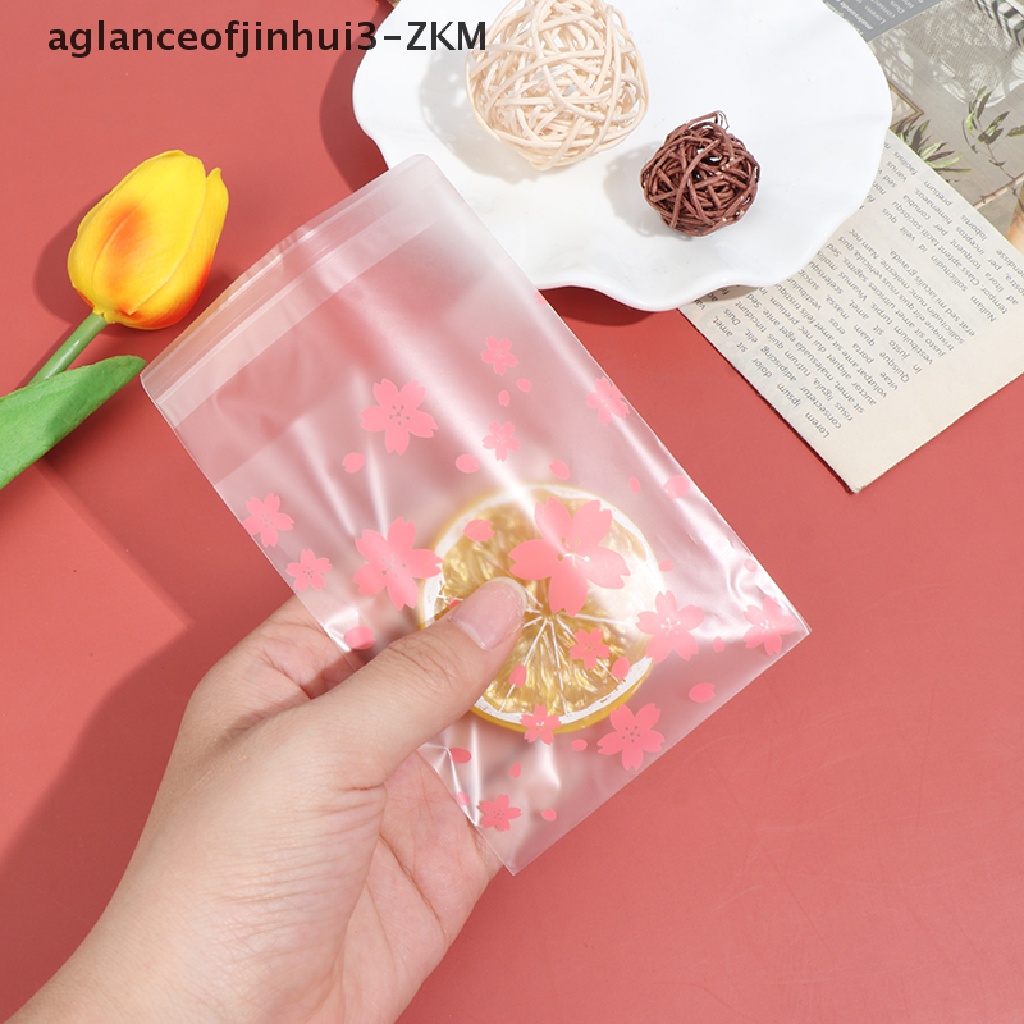 [AGID] 100Pcs/Set Dots Cherry Blossoms Cookie Candy Bag Plastic Package Holder Gift [zkm]