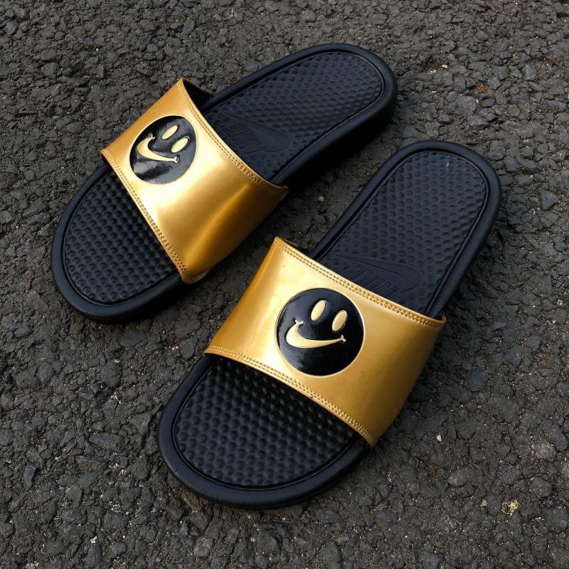 nike slides with smiley face