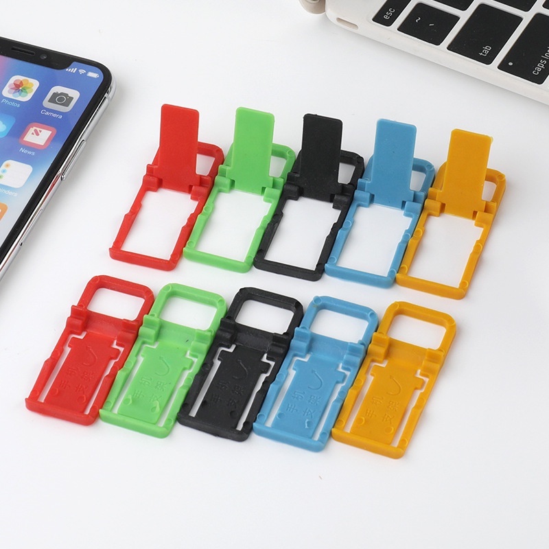 Bracket Lipat Mini Portable Universal Bahan Plastik Warna-Warni Untuk Smartphone