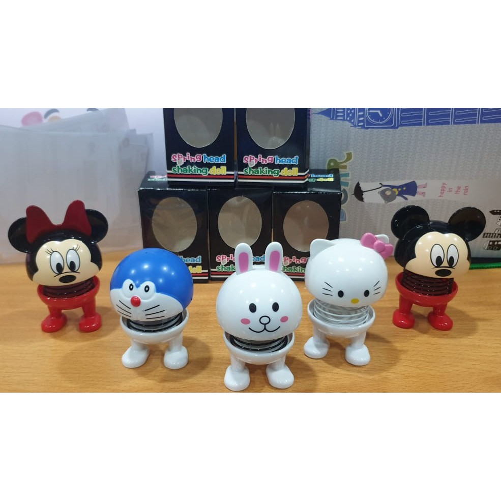 spring head shaking doll