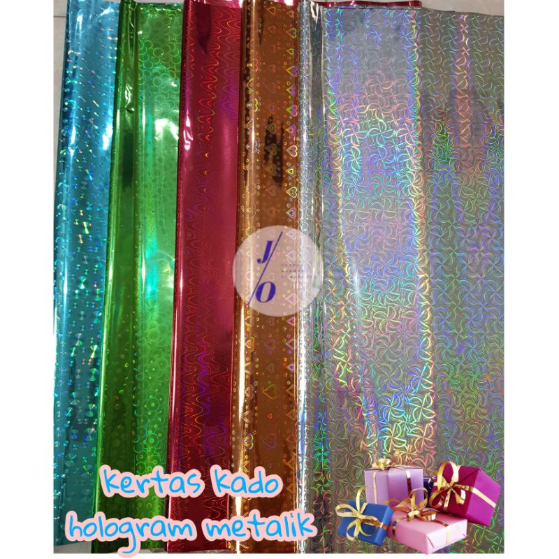 

KERTAS KADO natal HOLOGRAM METALIK /PLASTIK KADO HOLOGRAM KILAT BUNGKUS KADO KILAT UMBUL UMBUL KERTAS KADO PONTIANAK