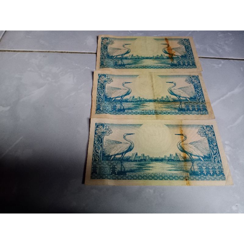 uang 25 asli kertas