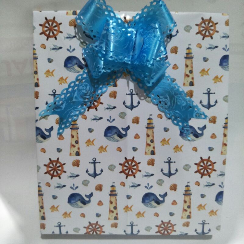 

Bungkus Kado + pita + ucapan