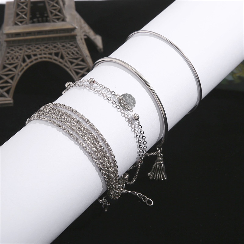 4pcs / Set Gelang Rantai Multilayer Model Rumbai Warna Silver Glossy Untuk Wanita