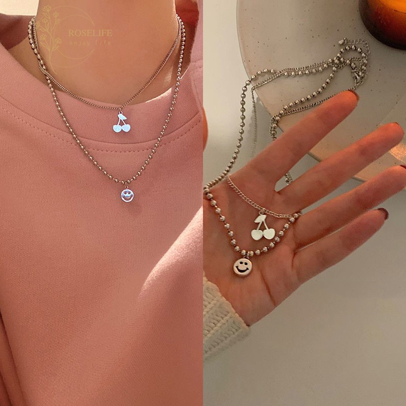 Roselife 2Pcs / Set Kalung Rantai Stainless Steel Liontin Buah Ceri Smiley Face Untuk Wanita