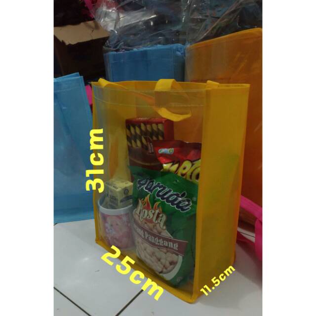 

TAS MIKA A4, Tas Goodiebag Ultah, sembako,idul fitri, natal, imlek, Parcel, Tas bening, spunbond hampers.