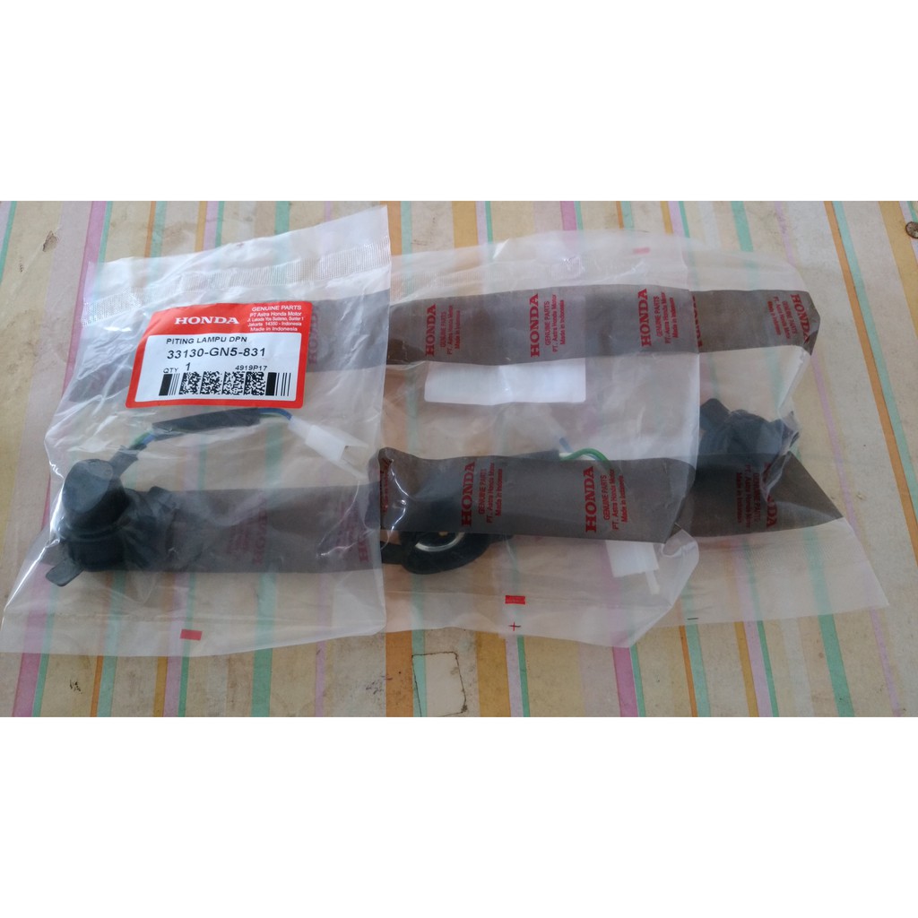 Piting Lampu Depan Grand