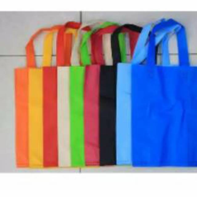 

Tas Kain - Tas Promosi - UK 38*45*8 - goodie bag - tas spundbound - tas sembako