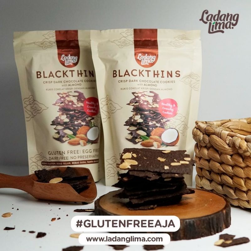 

Blackthins 100g Ladang Lima (Crisp dark chocolate cookies with almond) cemilan coklat kokis crispy