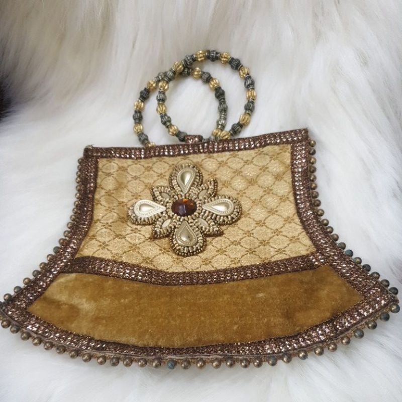 DOMPET ETNIK PRELOVED