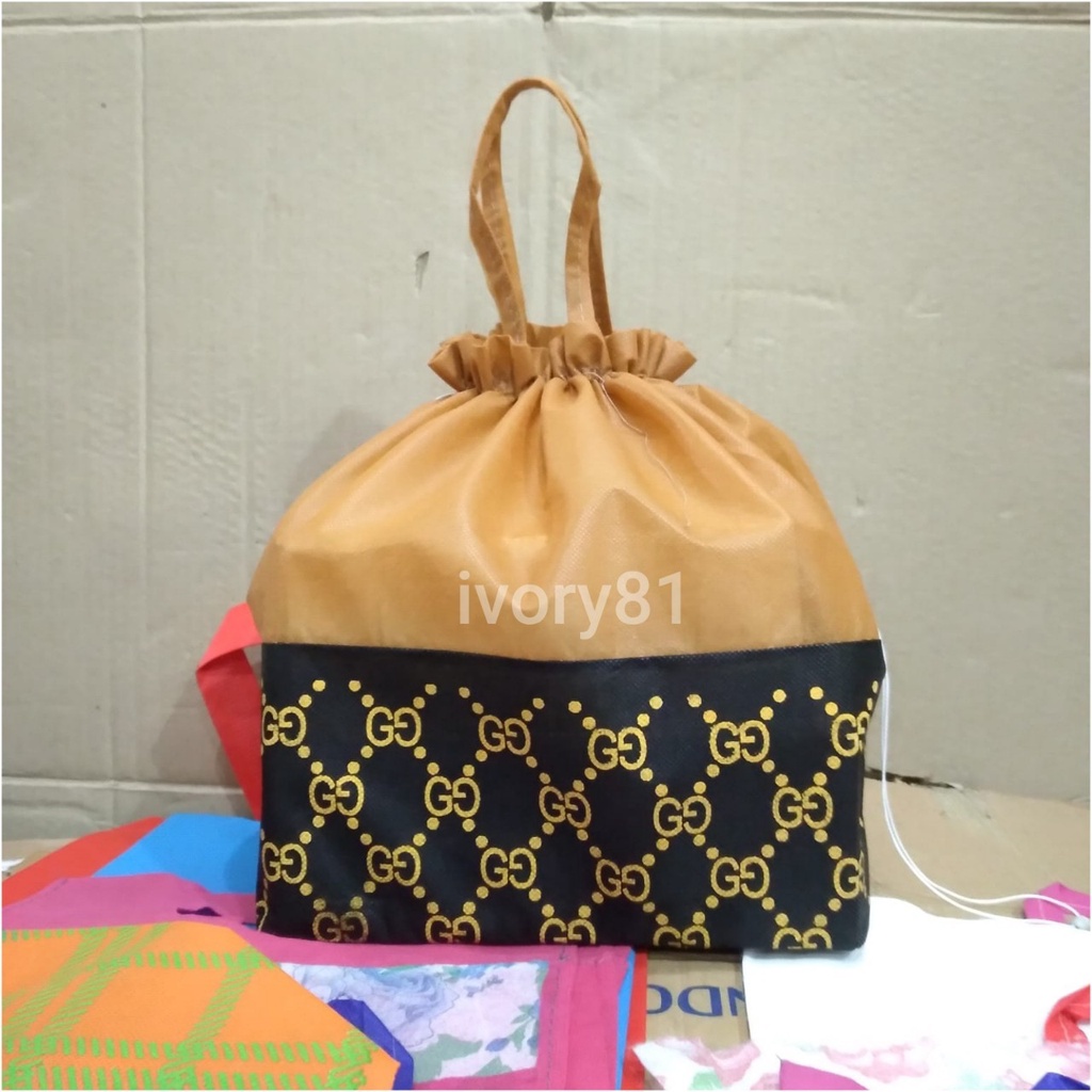 

Tas hajatan spunbond serut motif coklat 22 lusinan