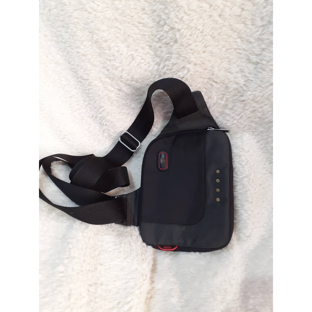 Tas Second / Preloved TUMI SLING, CROSS BODY