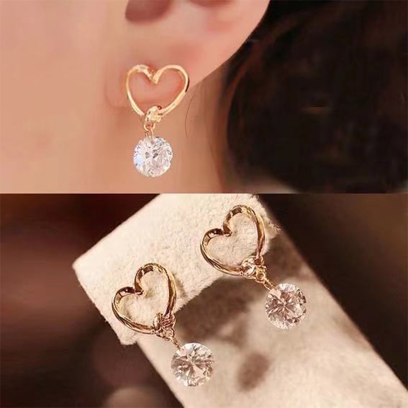 Anting Bentuk Hati Model Hollow Aksen Zircon Warna Emas Gaya Korea Untuk Wanita