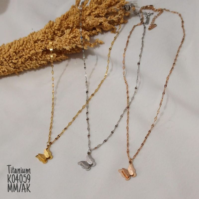 Kalung titanium kupu rosegold/gold K04059