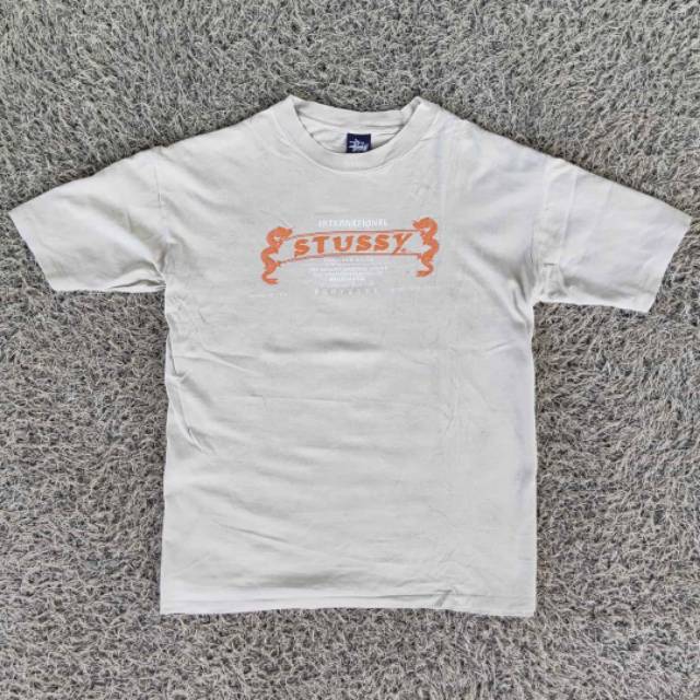 harga baju stussy