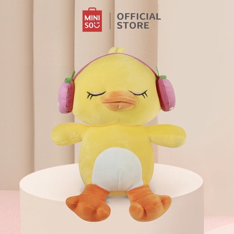 MINISO Boneka kecil mengenakan earphone Boneka Lucu Lembut dan halus Dengan bahan yang nyaman Ukurannya sepuluh inci Boneka