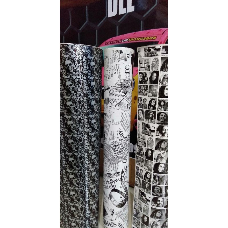 

Bahan Stiker MOTIF Tengkorak,Koran Dll