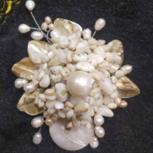 Bros kulit kerang cendrawasi mutiara air tawar lombok