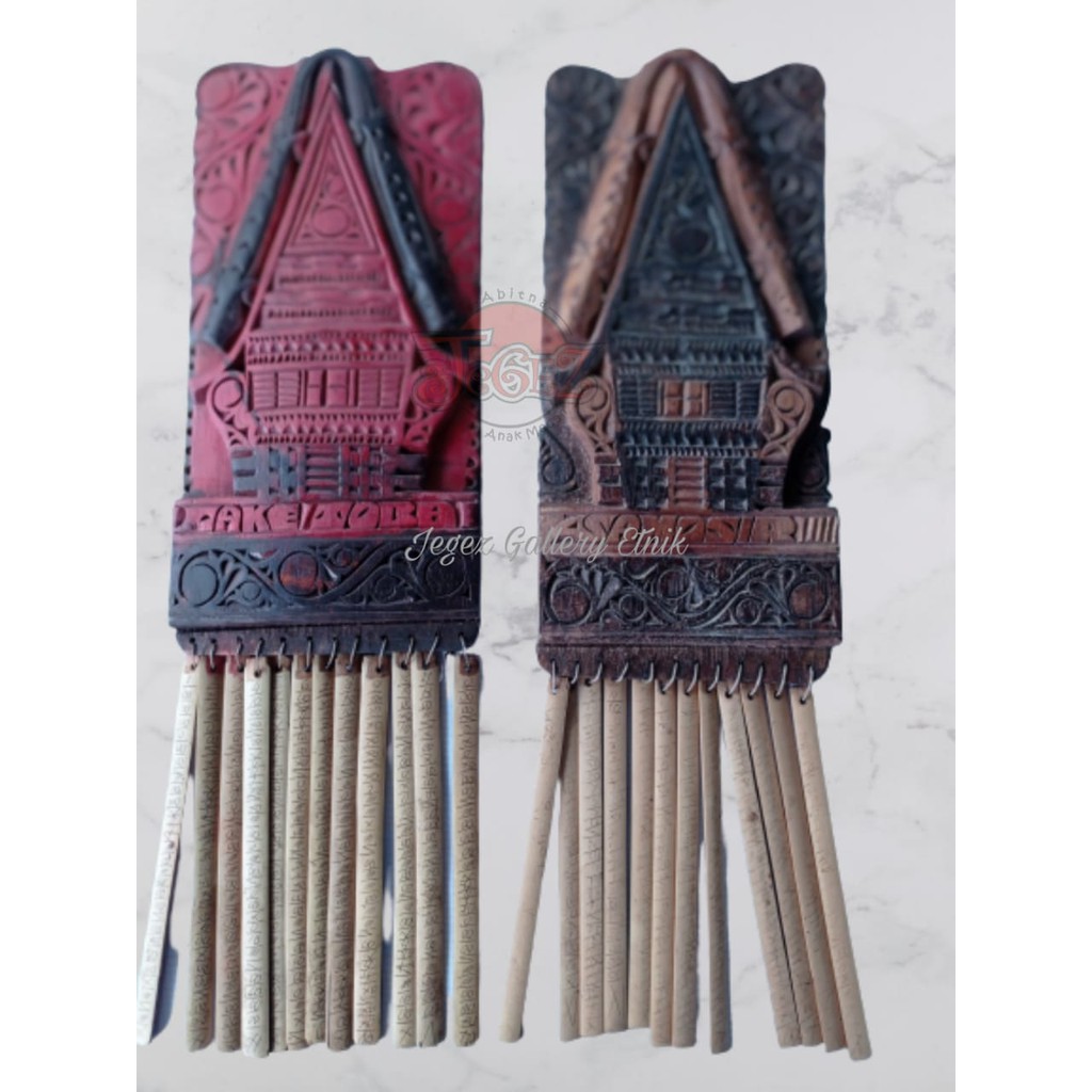 

Handycraft kayu ukiran hiasan rumah kalender batak