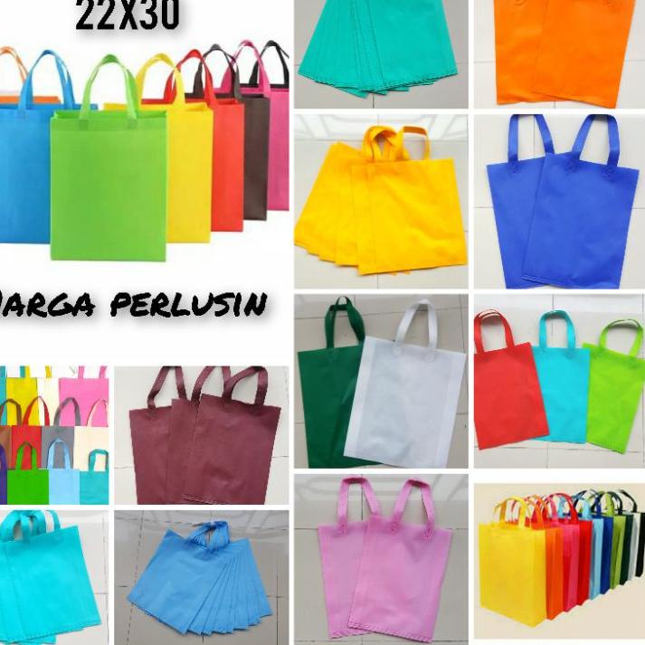 

Promo - tas spon Bond tenteng ukuran 22x 30. isi 12 pcs .,