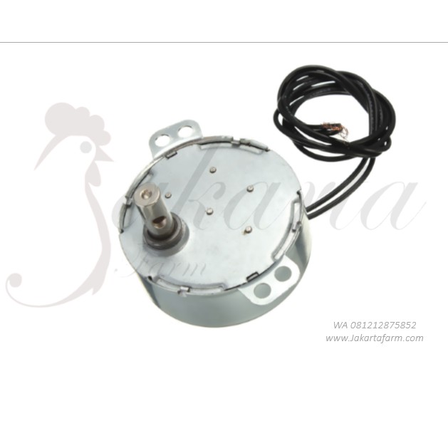 Dinamo AC untuk penggerak mesin penetas telur otomatis.