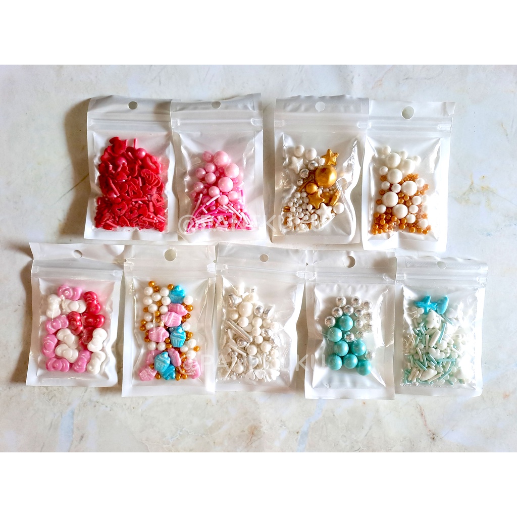 

Sprinkel mutiara/ Sprinkle hiasan ulang tahun warna warni/ Springkel bintang star/ Trimit/ Spikel gold silver