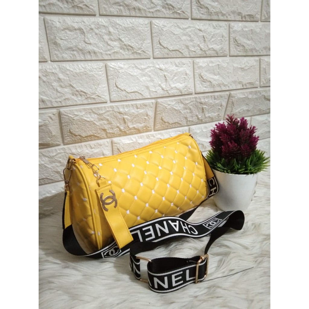 Tas slempang motif dan modeltabung