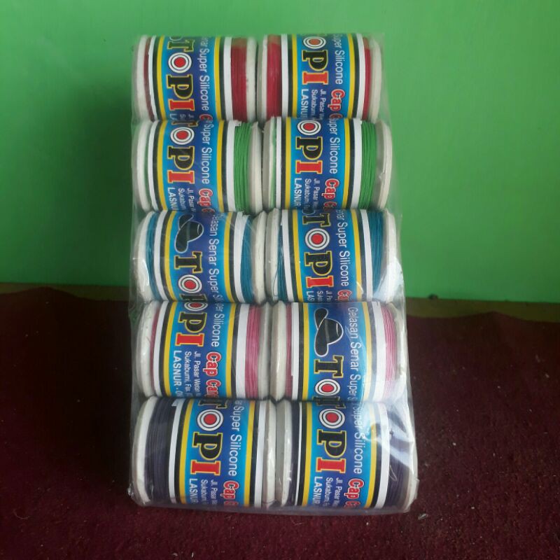 Gelasan layangan Snap Ck Topi