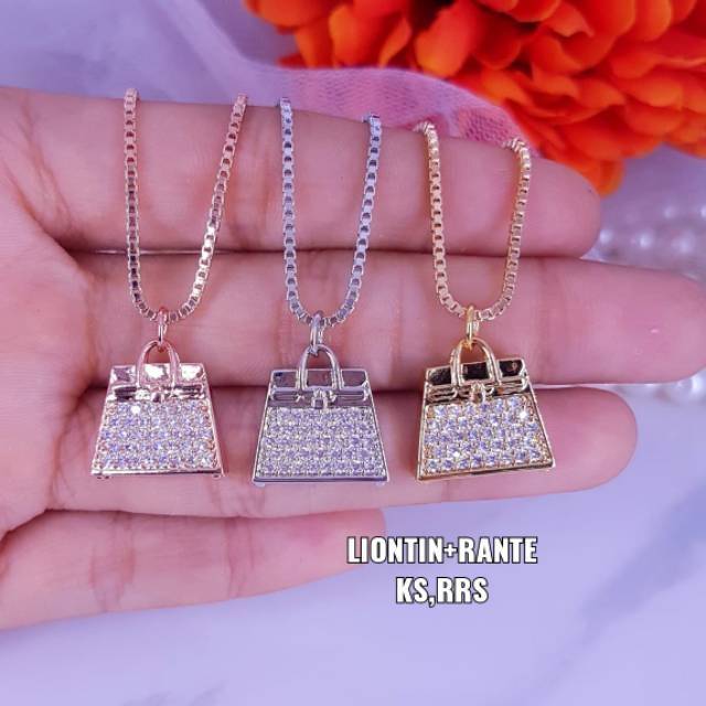 Kalung liontin nikita mirzani ,panjang liontin ±1.2cm titanium , ready semua warna