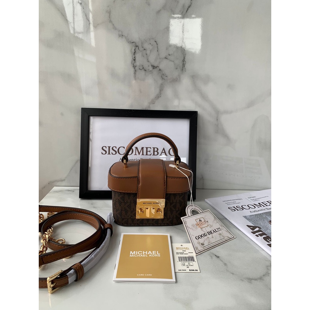 MK rose mini trunk crossbody brown