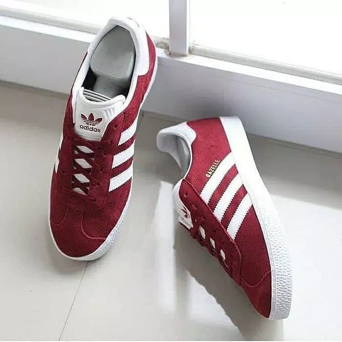 maroon colored sneakers