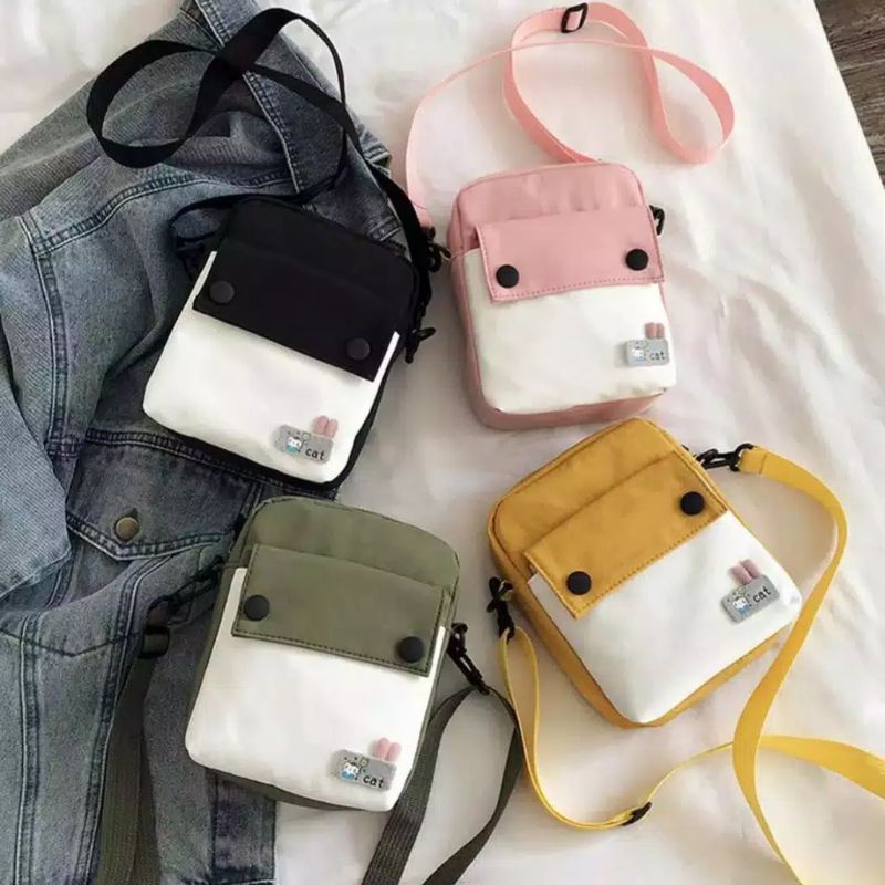 

TAS SELEMPANG CAT HAPPY