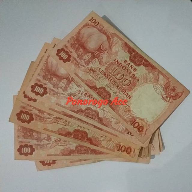 (GRESS/AU/UNC) Uang kuno 100 rupiah badak tahun 1977