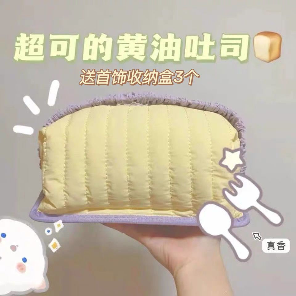 ❃❦Xiaohongshu dengan tas kosmetik roti panggang krim yang sama tas penyimpanan berkapasitas besar tas cuci rias portabel wanita yang nyaman