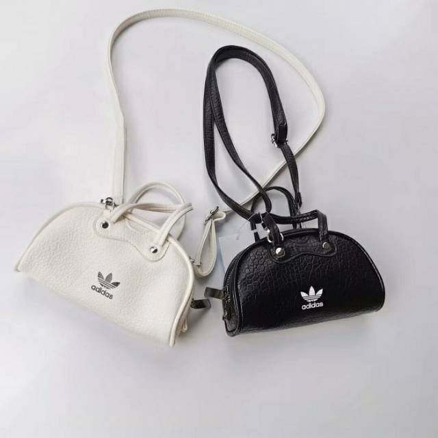 8530. Adidas Half Circle Sling Bag. Bahan PU Leather