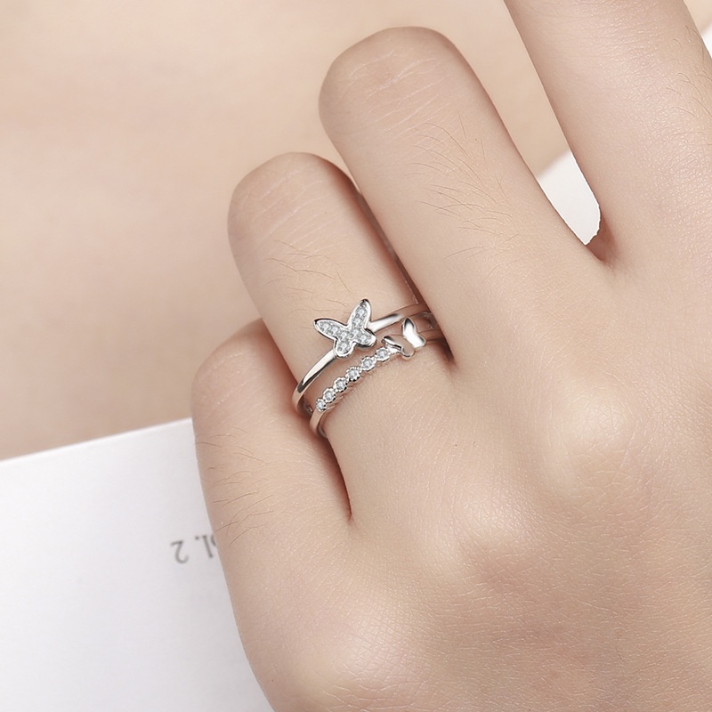 Cincin Model Terbuka Adjustable Desain Butterfly Bahan Zircon Warna Silver Untuk Pesta