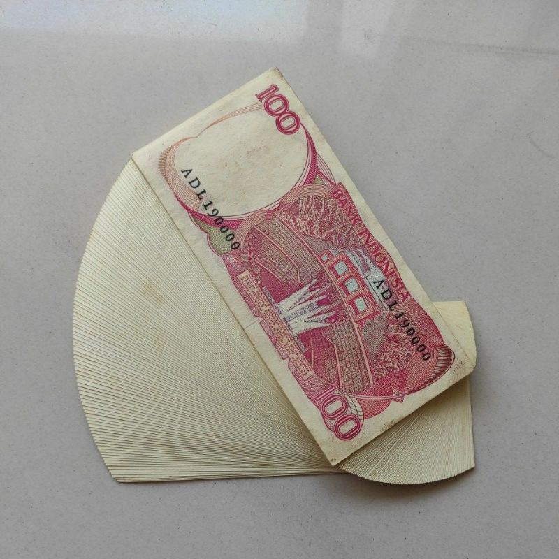 UANG KUNO INDO BURUNG GOURA 100 RUPIAH 1 GEPOK URUT