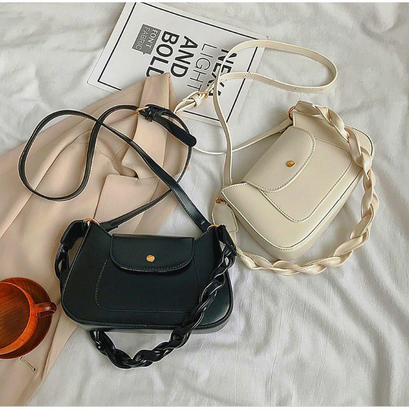 TAS SELEMPANG WANITA KEPANG MINISO VTRI-136Variasi：hitam, putih , coklat
(Silakan menghubungi saya u