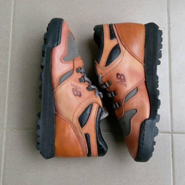 new balance 710 leather