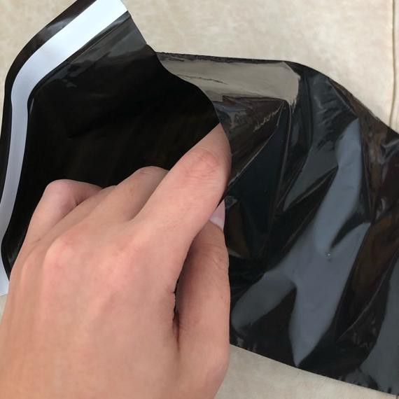 

LE7 Plastik polymailer / kantong kurir dhl uk 30x40 black glossy isi 100❀® (Ready)