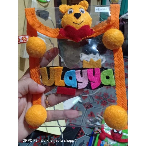 

Tempat tabungan boneka nama