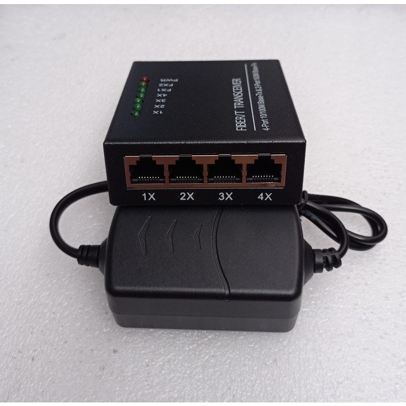 Media Converter 2FO 4LAN 10/100 / 2sc 4rj45 Termasuk casing dan Adaptor