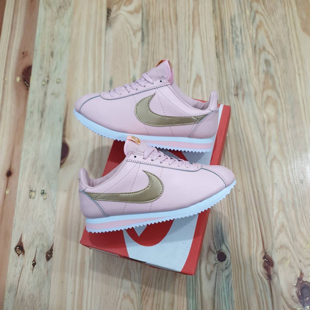 pink gold nike cortez
