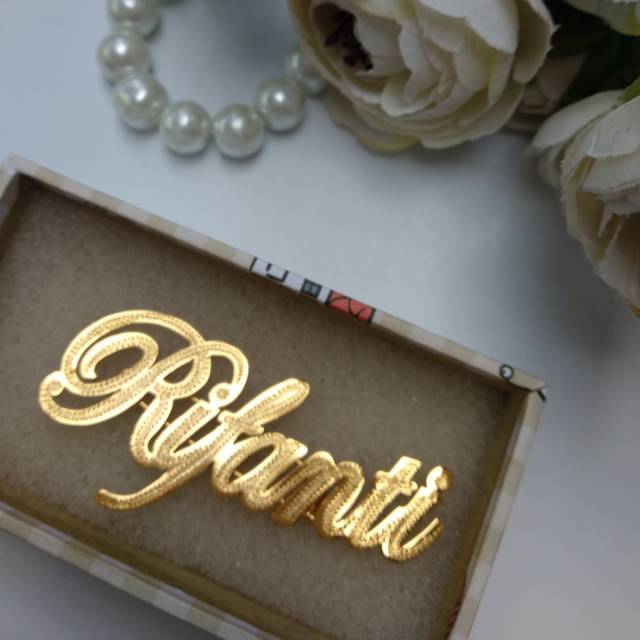 Bros peniti lapis emas