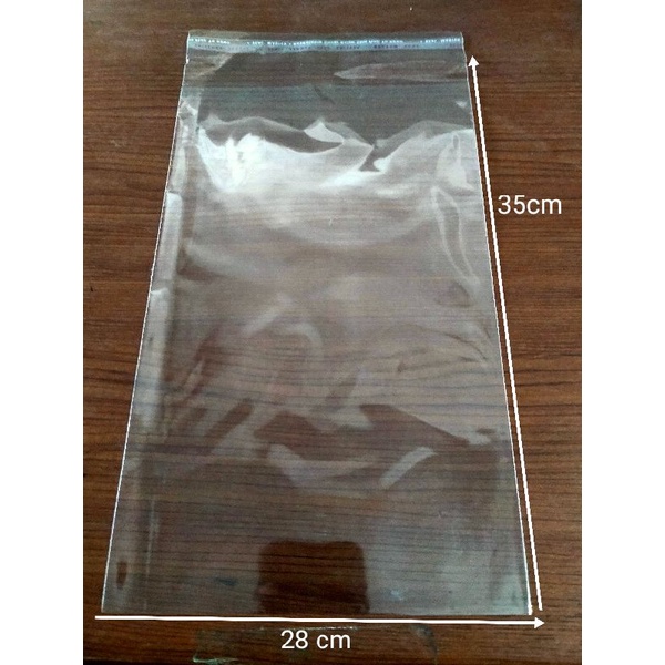 Plastik lem opp baju 28x35