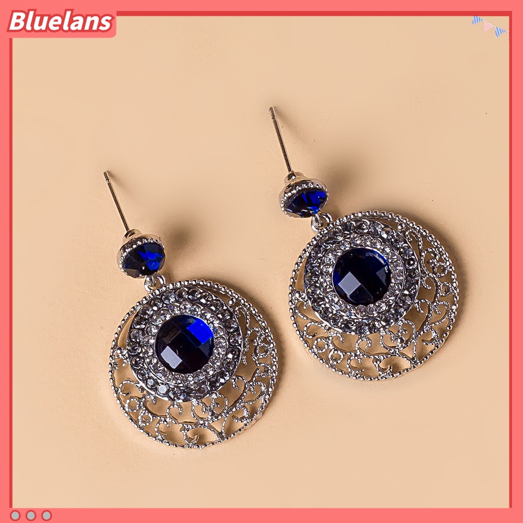 Anting Stud Bentuk Bulat Hollow Aksen Berlian Imitasi Warna Biru Untuk Wanita