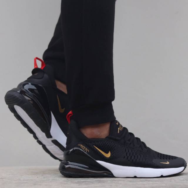 nike 270 black and gold