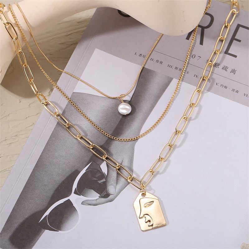 Set Kalung Multilayer Liontin Wajah Timbul Aksen Mutiara Bahan Alloy Gaya Hip Hop Untuk Wanita